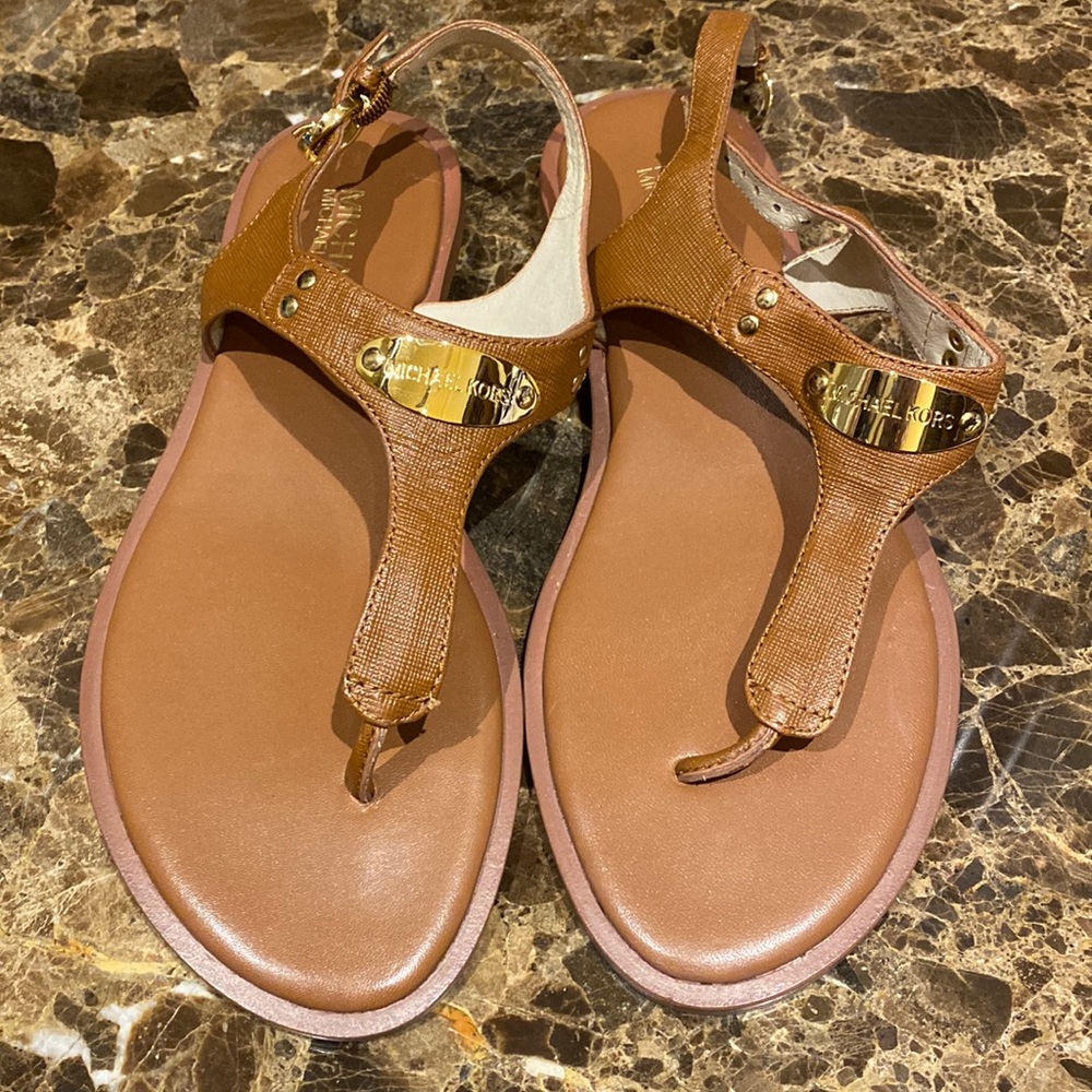 Brown Michael kors sandals. Never worn.